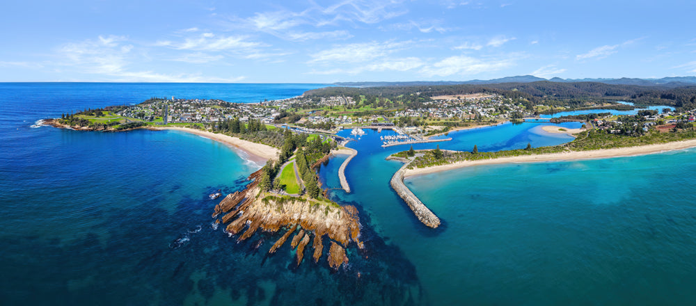 Aerial view of the headland and harbour at Bermagui, New South Wales - fine art photography print by Adam Gormley