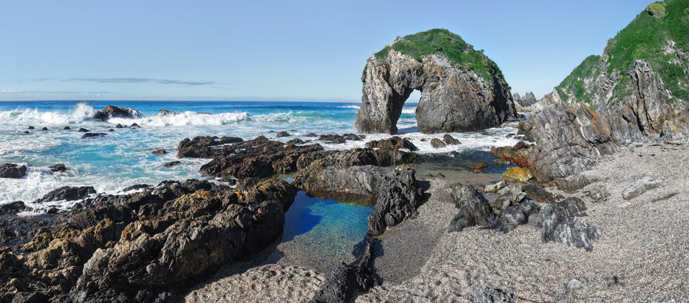Arch of Horse Head Rock above the rock platform near Bermagui, New South Wales - fine art photography print by Adam Gormley