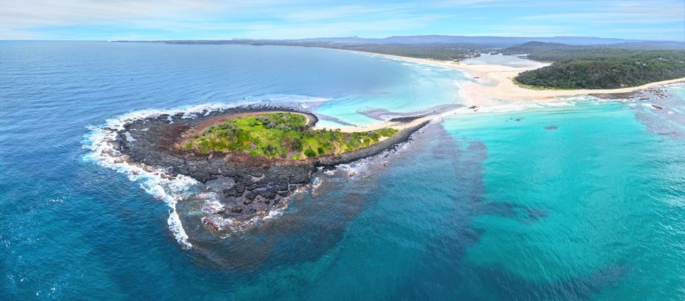 Rocky island in turquoise water off Cunjurong Point, New South Wales - fine art photography print by Adam Gormley