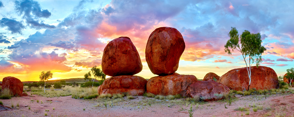 Two balanced granite boulders at sunset, Karlu Karlu (Devils Marbles), Northern Territory - fine art photography print by Adam Gormley