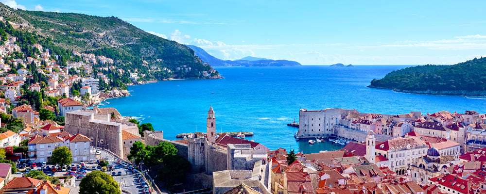 Red rooftops of Dubrovnik Old Town and the Adriatic Sea, Croatia - fine art photography print by Adam Gormley