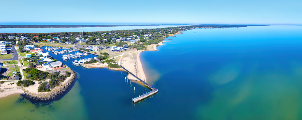 Aerial view of the marina and jetty at Loch Sport, Gippsland Lakes, Victoria - fine art photography print by Adam Gormley