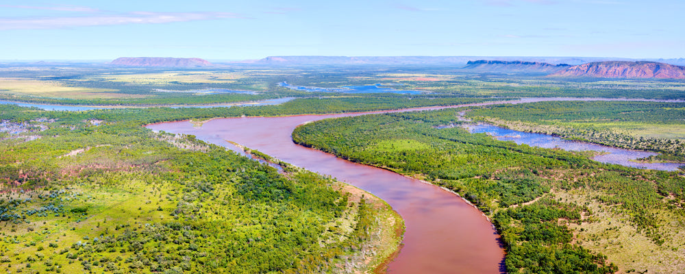 Aerial view of the Mann River winding through Arnhem Land, Northern Territory - fine art photography print by Adam Gormley