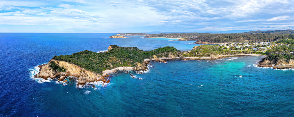 Rocky green headland in deep blue water near Batemans Bay, New South Wales - fine art photography print by Adam Gormley