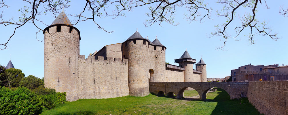 Towers and stone bridge of the Château Comtal, Carcassonne, France - fine art photography print by Adam Gormley