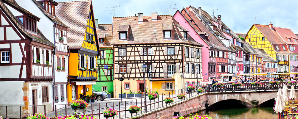 Colourful half-timbered houses beside the canal in Colmar, Alsace, France - fine art photography print by Adam Gormley
