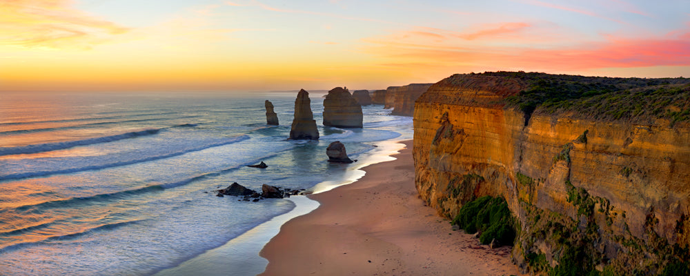 Pink and gold sunset over the Twelve Apostles, Great Ocean Road, Victoria - fine art photography print by Adam Gormley