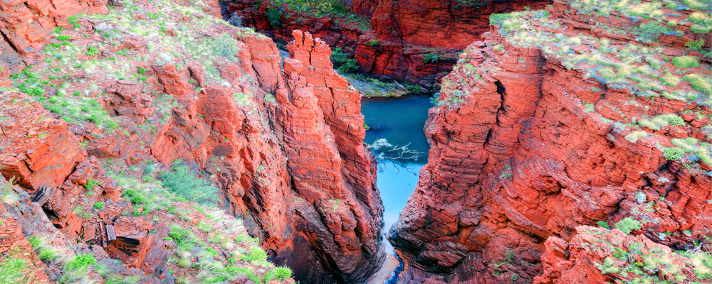 Red gorge walls and pool seen from Oxer Lookout, Karijini National Park, Pilbara, Western Australia - fine art photography print by Adam Gormley