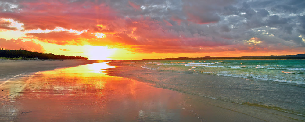 Golden sunlight reflected in wet sand at Inskip Point, Queensland - fine art photography print by Adam Gormley