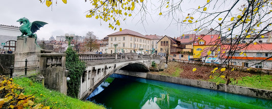 Dragon statue on the Dragon Bridge over the Ljubljanica River, Ljubljana, Slovenia - fine art photography print by Adam Gormley
