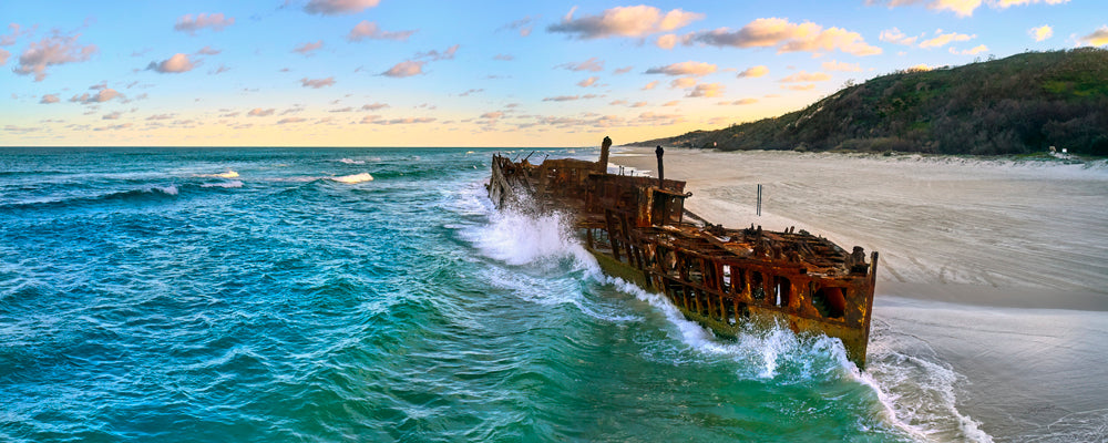 Waves breaking over the Maheno shipwreck looking north, K'gari (Fraser Island), Queensland - fine art photography print by Adam Gormley