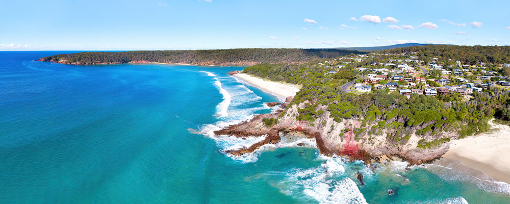 Aerial view of red rocks and surf at Pambula Beach, New South Wales - fine art photography print by Adam Gormley