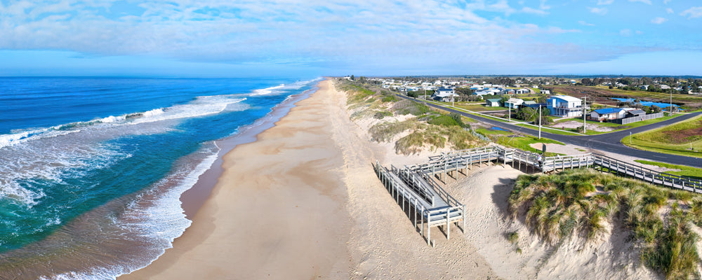 Aerial view of Seaspray and Ninety Mile Beach, Gippsland, Victoria - fine art photography print by Adam Gormley