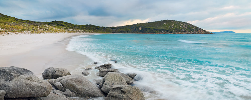 Turquoise water around granite rocks on a white sand beach, Wilsons Promontory, Victoria - fine art photography print by Adam Gormley